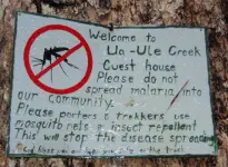 A guest house sign asking trekkers to help stop malaria spreading