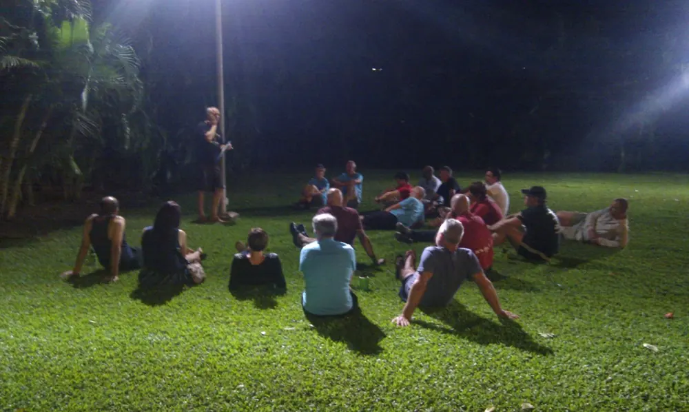 Trekkers gathered on the hotel lawn in the evening