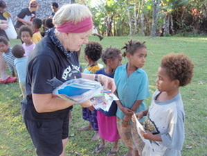 Handing out gifts to kids at Kagi