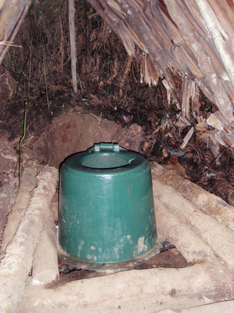 Pit toilet with seat