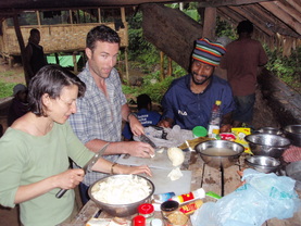 Trekkers helping prepare dinner at Va-Ule Creek campsite
