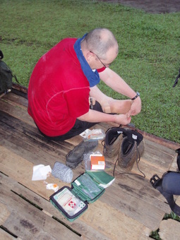 Performing first aid on feet